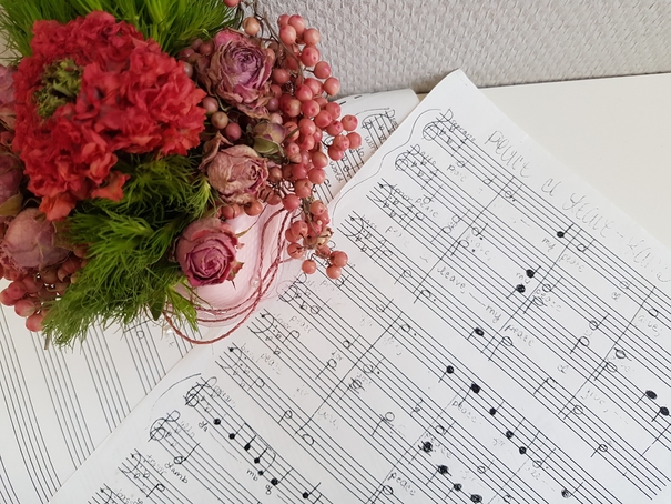 handwritten music with flowers